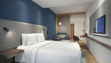 Caja fuerte, escritorio, cortinas opacas y sistema de insonorización