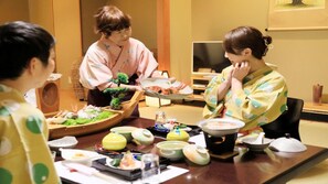 A dining table with various dishes and a small bonsai tree. - Yuyado Mikan No Ki (Atami)