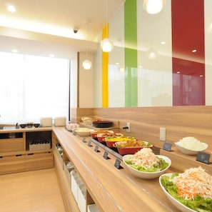 A buffet area with various food options, a wooden counter, and a modern interior design. - Ab Hotel Ubeshinkawa (Ube)