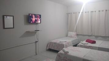 Frigobar, cortinas blackout, Wi-Fi de cortesia, roupa de cama