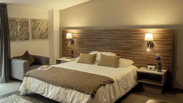 Premium bedding, down comforters, minibar, in-room safe