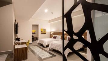 Premium bedding, down comforters, minibar, in-room safe