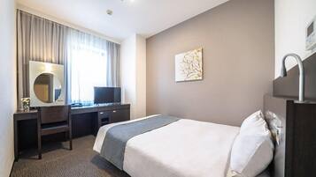 Cubrecamas, escritorio y cortinas blackout
