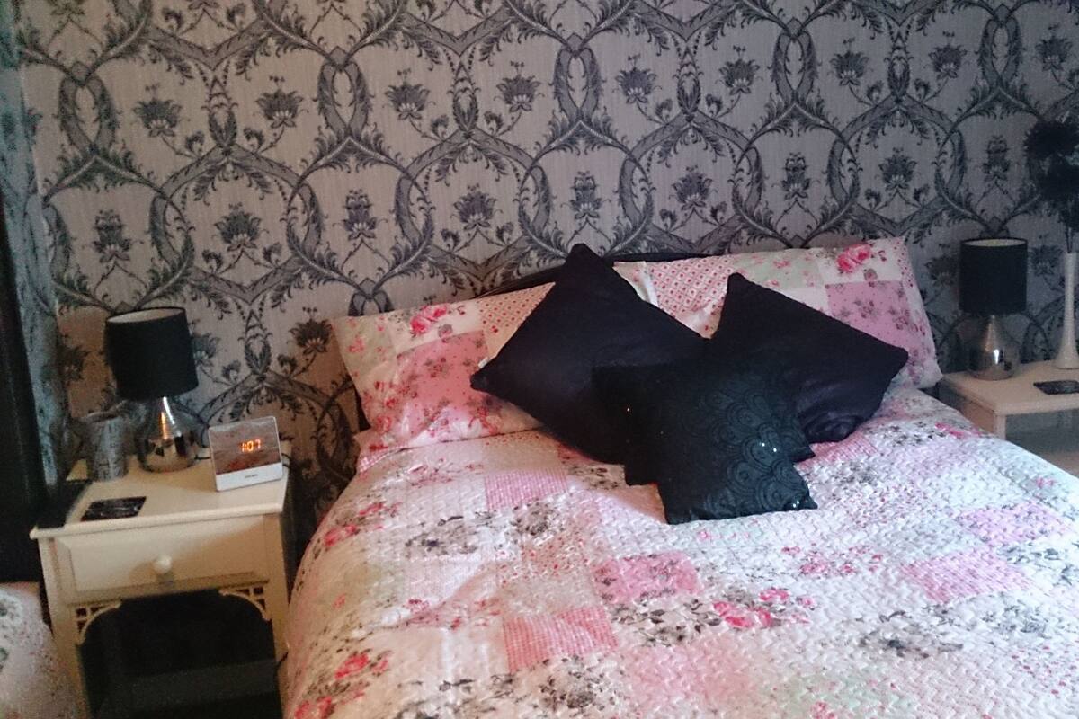 Blackout curtains, iron/ironing board, rollaway beds, free WiFi
