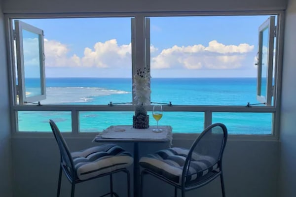 Apartment, Sea View | Living area | TV