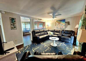Smart TV, DVD player, foosball, books