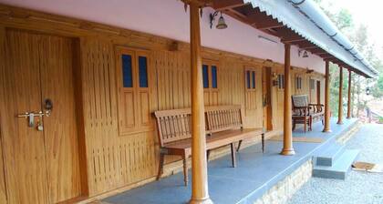 Nature Castle-A Traditional Kerala Style wooden home