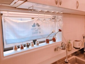 Fridge, microwave, cookware/dishes/utensils