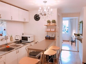 Fridge, microwave, cookware/dishes/utensils