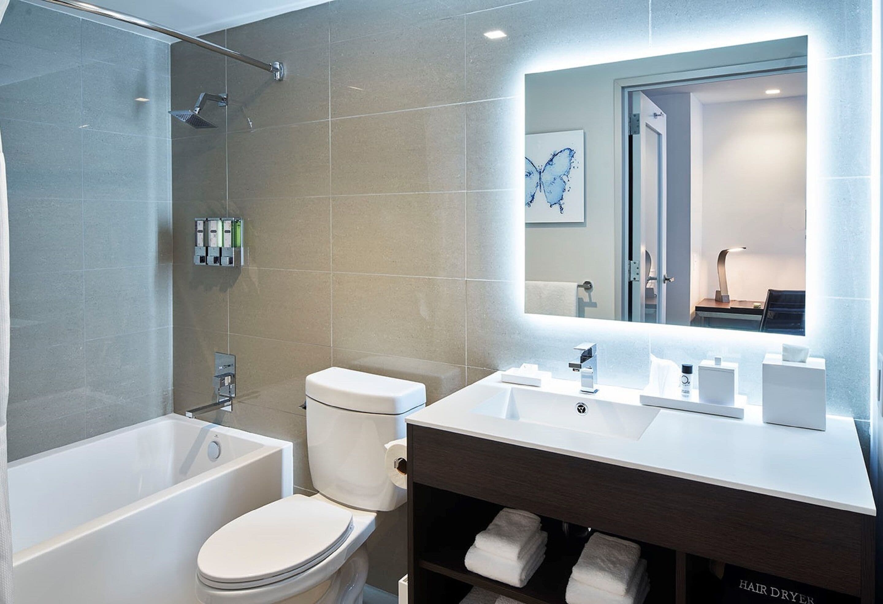 combined shower/bathtub, hair dryer, bathrobes, towels