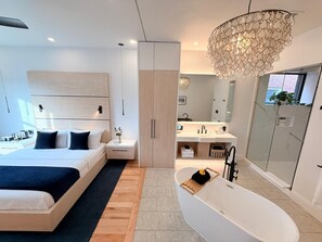 Luxury Room 1 | Premium bedding, minibar, blackout drapes, iron/ironing board - Cribs on Main (Prince Edward)