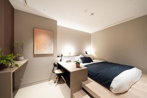 Cortinas blackout, wifi gratis y ropa de cama