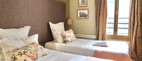 3 habitaciones, tabla de planchar con plancha, wifi y ropa de cama