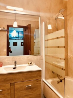 Hair dryer, towels, soap, shampoo