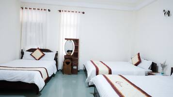 Standard Triple Room | Blackout drapes, free WiFi, bed sheets