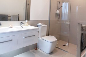 Luxury House, 4 Bedrooms, Ocean View | Bathroom | Slippers, towels - Modern Coastal Home & Award-winning Golf (Whangaparaoa)