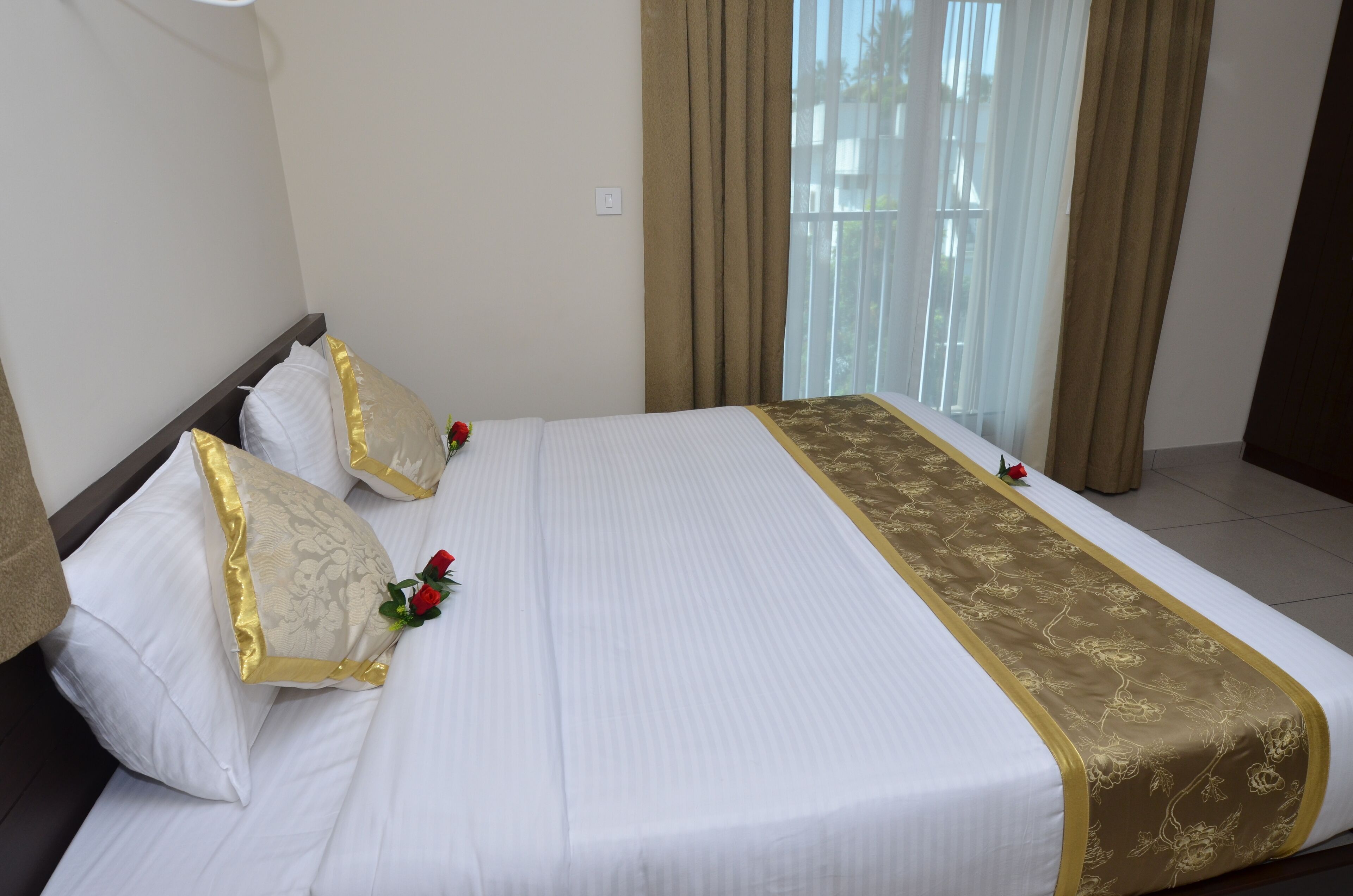 premium bedding, desk, laptop workspace, blackout curtains