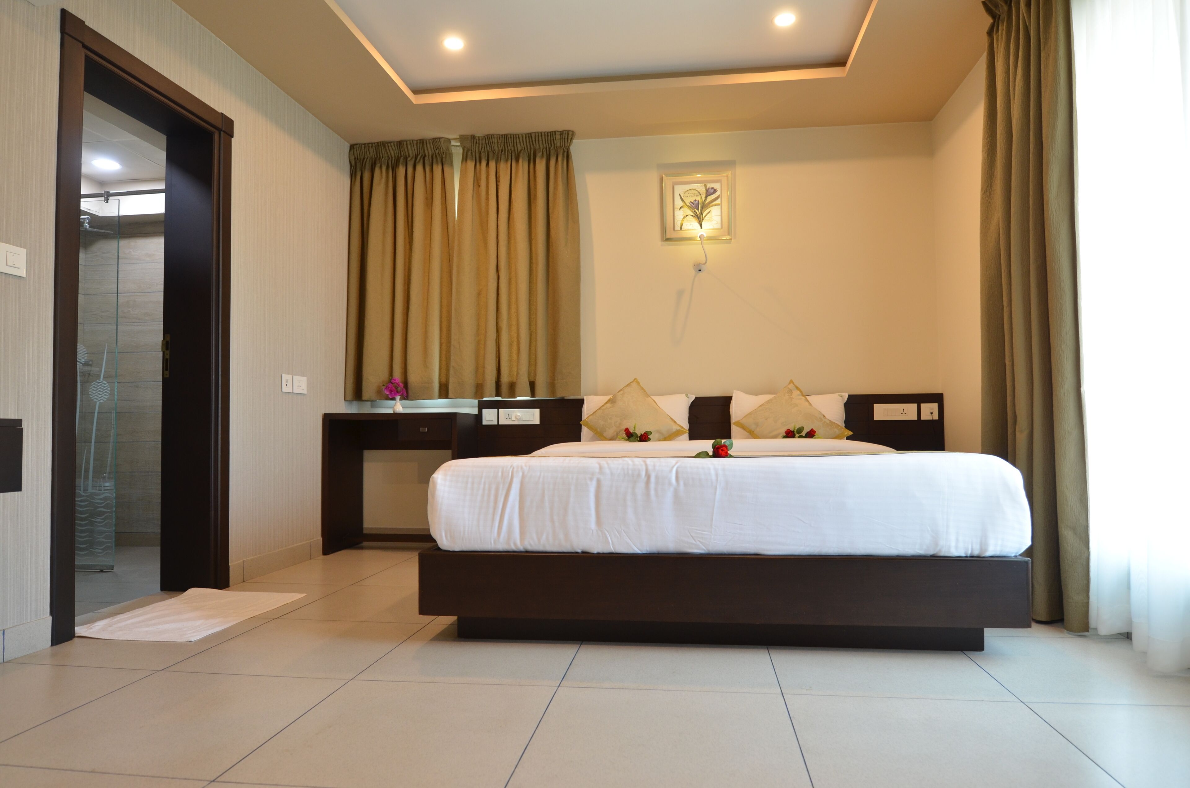 premium bedding, desk, laptop workspace, blackout curtains