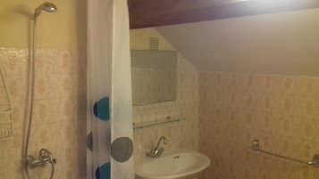Combined shower/tub, hair dryer, towels, soap