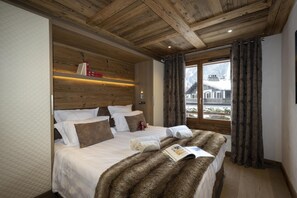 3 bedrooms, WiFi, bed sheets - Wifi, 50m from shops, fitness, swimming pool, sauna, hammam, balcony, ski locker, 78m², Chamonix (Chamonix-Mont-Blanc)