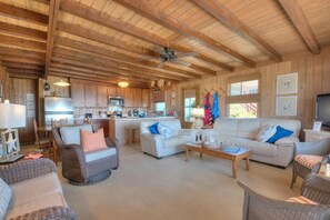 Living area - Experience oceanfront bliss at Oak Island's Holiday House: a 3-bedroom getaway for 8. (Oak Island)
