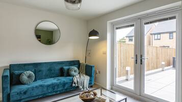 Two-Bedroom House | Living area | Flat-screen TV