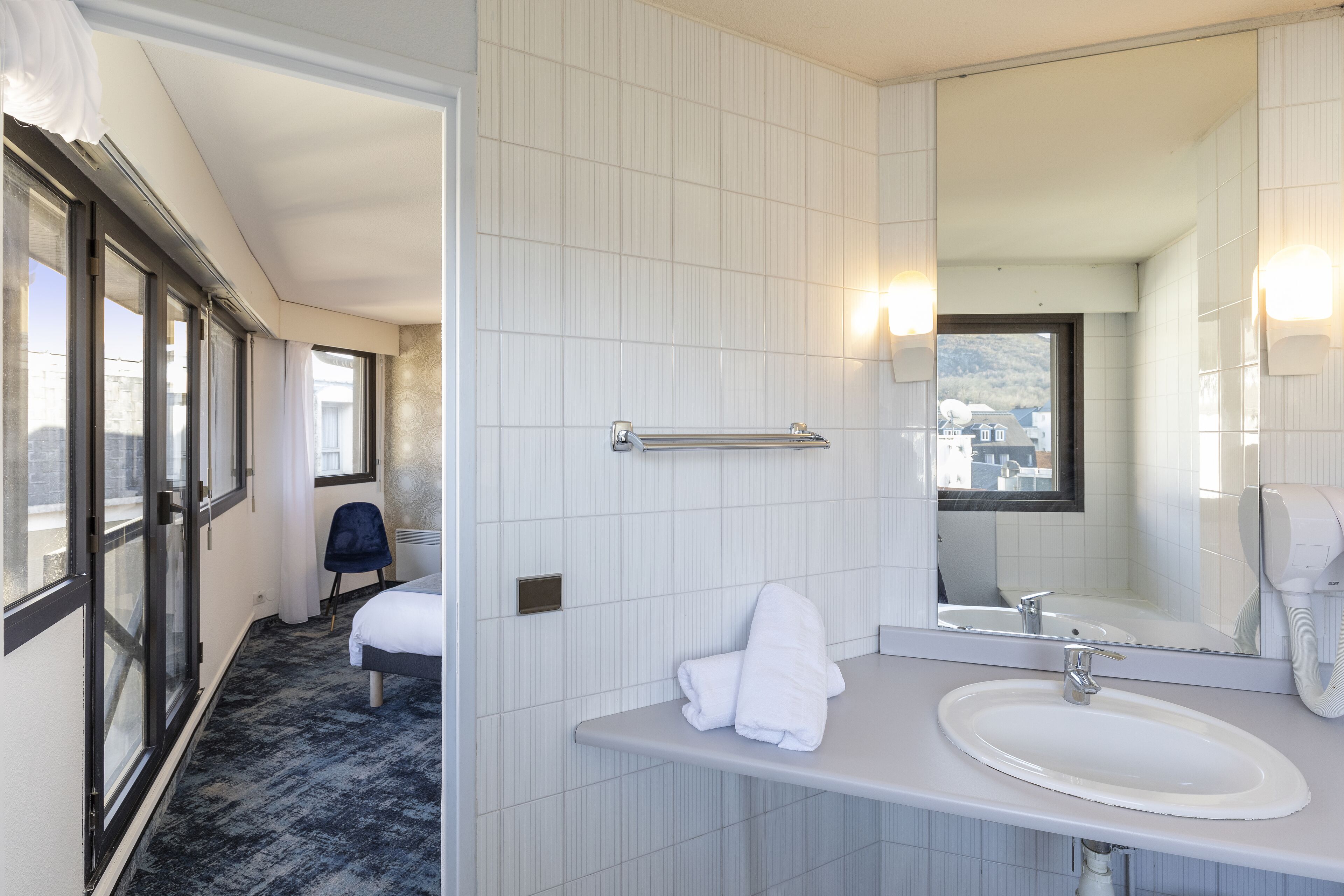 free toiletries, hair dryer, bidet, towels