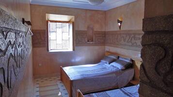 Chambre Triple, plusieurs lits | Draps fournis