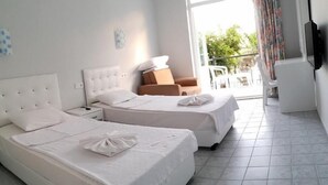 Basic Room, 1 Bedroom, Smoking, Garden View | Iron/ironing board (on request), cribs (free), WiFi (free), bed sheets - Iris Garden Hotel (Kemer)