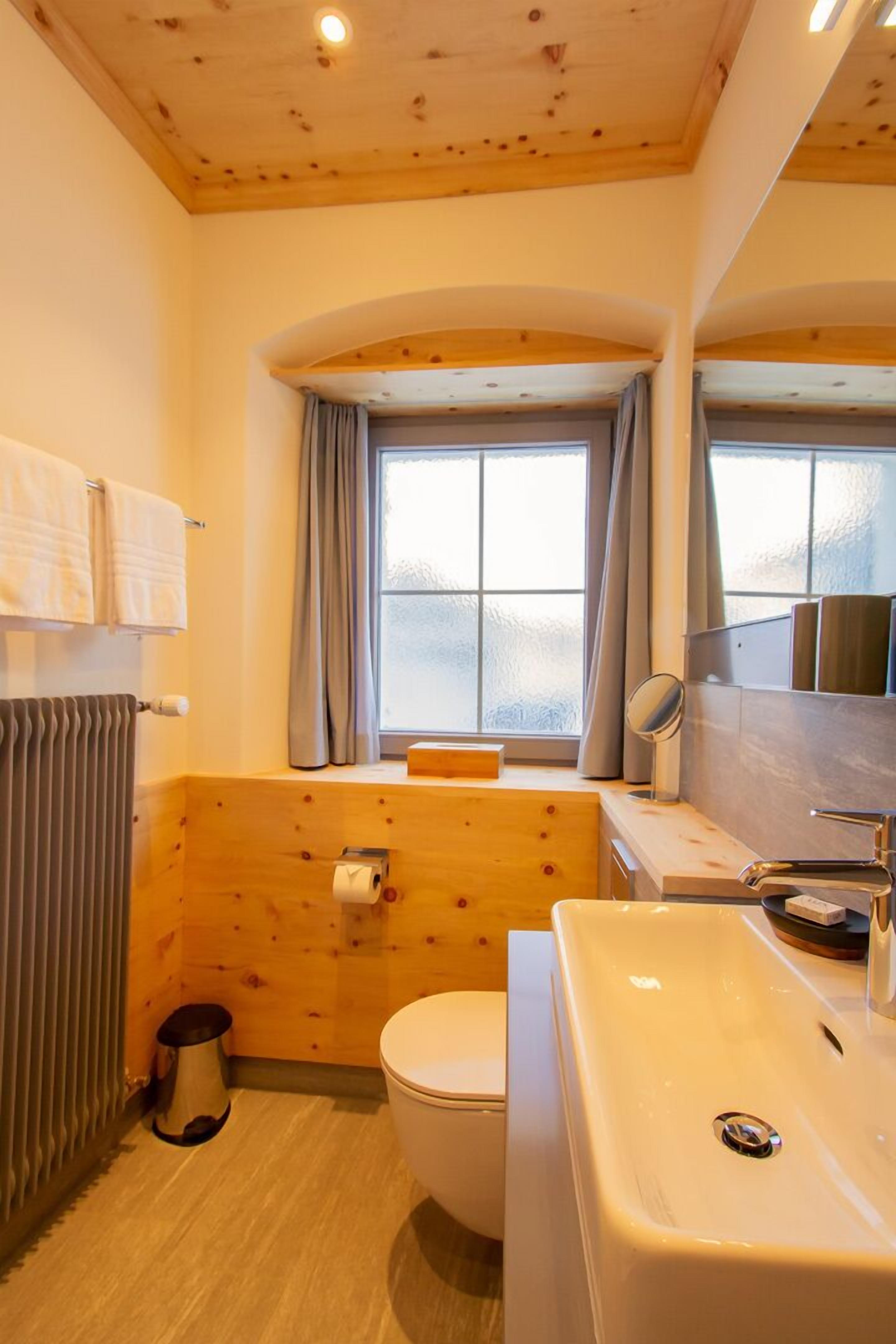 superior double room, mountain view | bathroom | hair dryer, bathrobes, towels