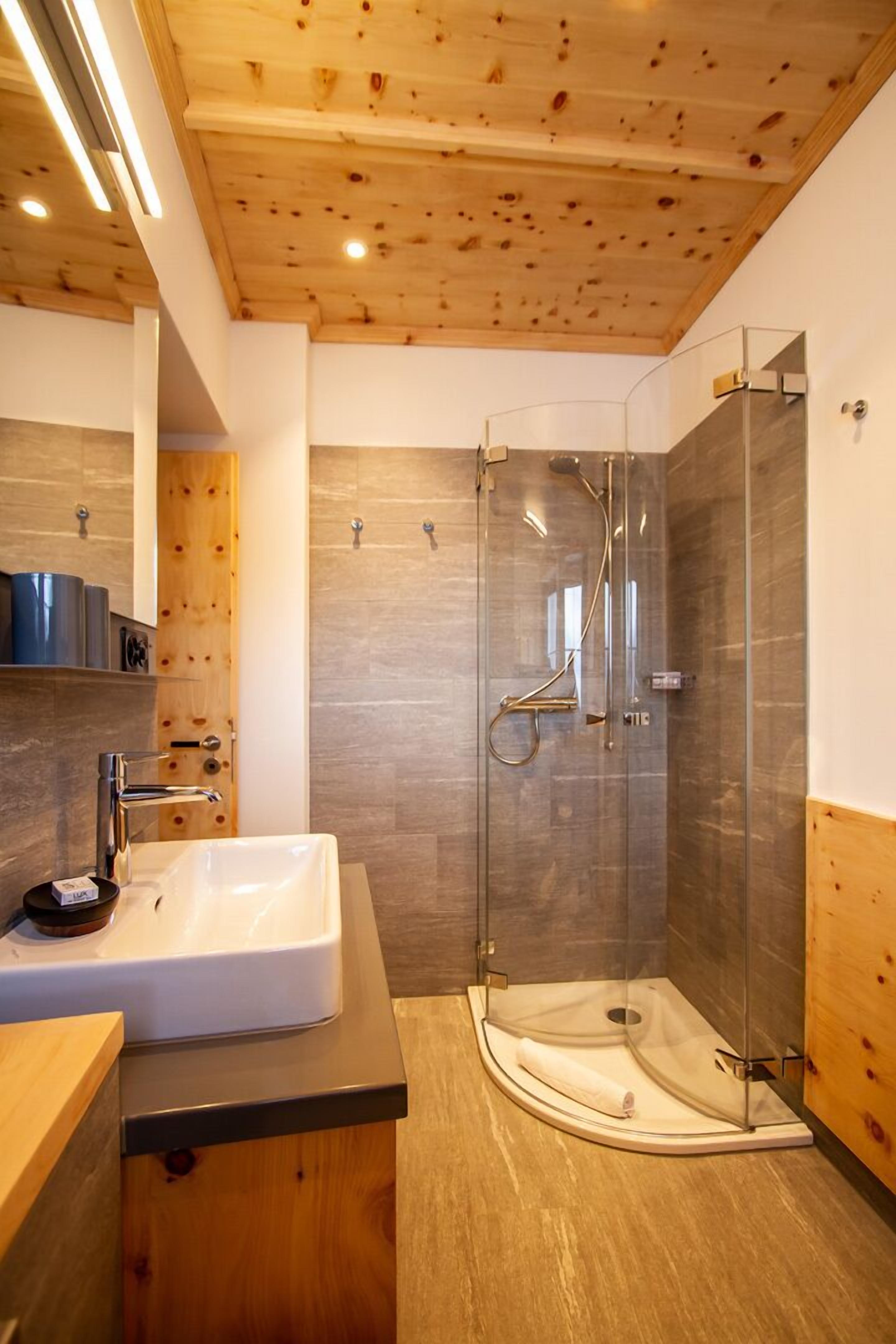 superior double room, mountain view | bathroom | hair dryer, bathrobes, towels