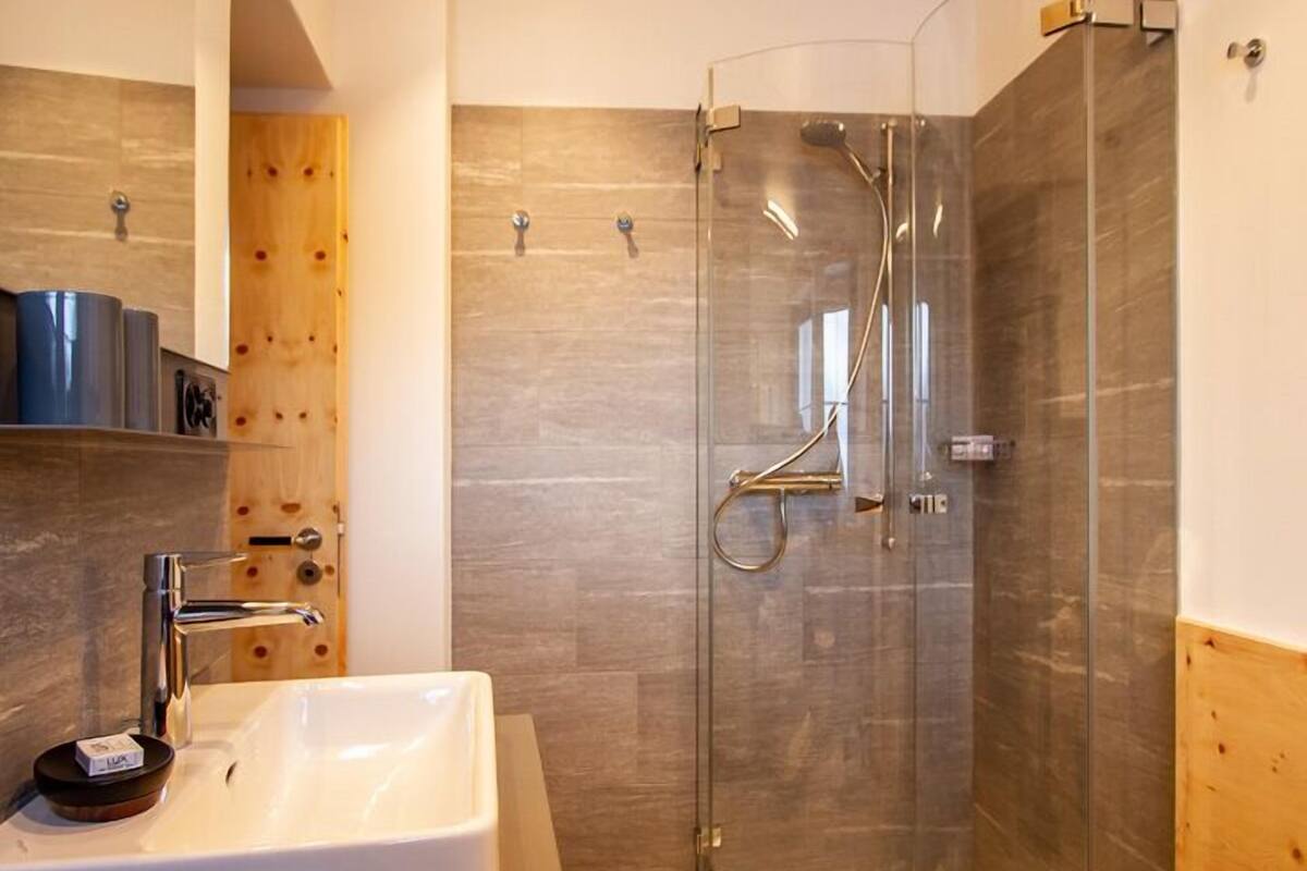 superior double room, mountain view | bathroom | hair dryer, bathrobes, towels