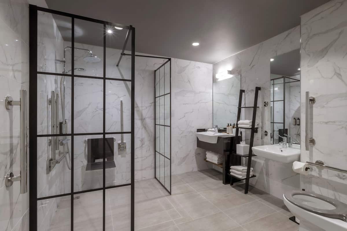 suite, 1 king bed | bathroom | designer toiletries, hair dryer, towels