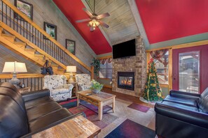 House, Multiple Beds, Hot Tub | Living area | 60-inch flat-screen TV with cable channels, TV, fireplace - Aqua Paradise - Six Bedroom Chalet (Gatlinburg)
