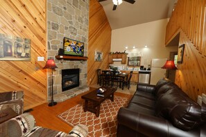 House, Multiple Beds, Hot Tub | Living area | 42-inch flat-screen TV with cable channels, TV, fireplace - Divine Escape - Two Bedroom Chalet (Gatlinburg)