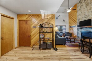 House, Multiple Beds, Hot Tub | Living area | 42-inch flat-screen TV with cable channels, TV, fireplace - Divine Escape - Two Bedroom Chalet (Gatlinburg)