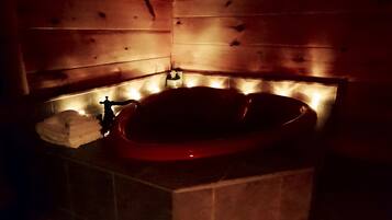 Cabin, 1 King Bed with Sofa bed, Fireplace | Bathroom | Combined shower/bathtub, hair dryer, towels