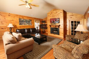House, Multiple Beds, Hot Tub | Living area | 42-inch flat-screen TV with cable channels, TV, fireplace - Cedar Falls 8 - Three Bedroom Chalet (Pigeon Forge)
