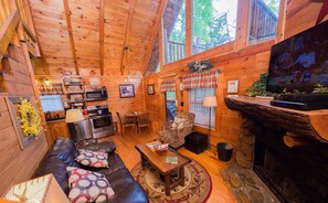 Cabin, Multiple Beds, Hot Tub | Living area | 42-inch flat-screen TV with cable channels, TV, fireplace - Secluded Escape - One Bedroom Cabin (Sevierville)