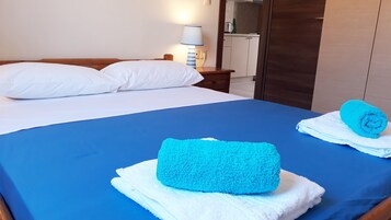 Signature Apartment, 1 Bedroom, Partial Sea View | Living area | Flat-screen TV