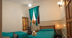 Basic Triple Room, Multiple Beds | 1 bedroom, free WiFi, bed sheets