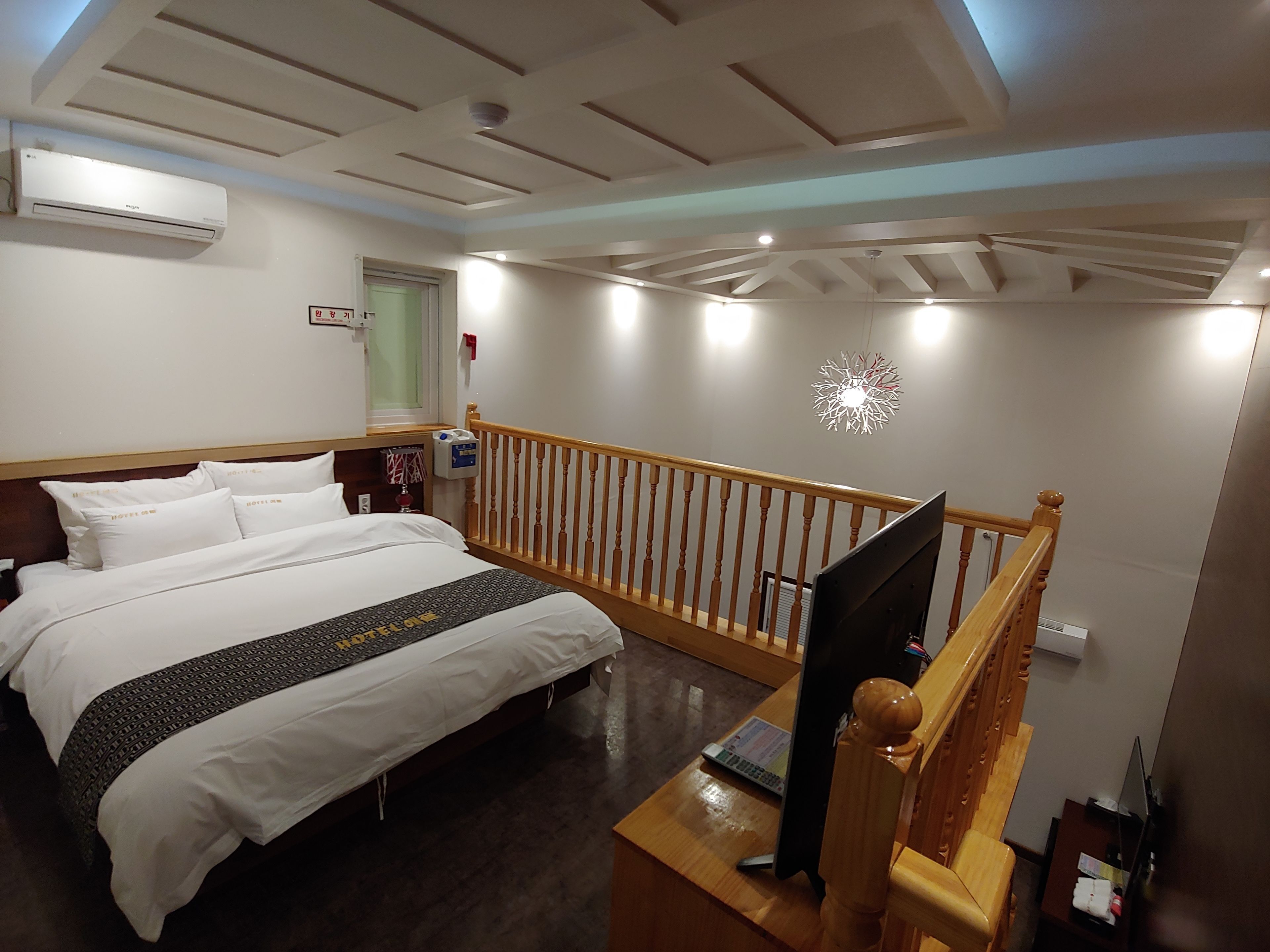 Premium bedding, down comforters, desk, laptop workspace