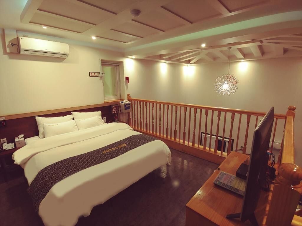 premium bedding, down duvets, desk, laptop workspace