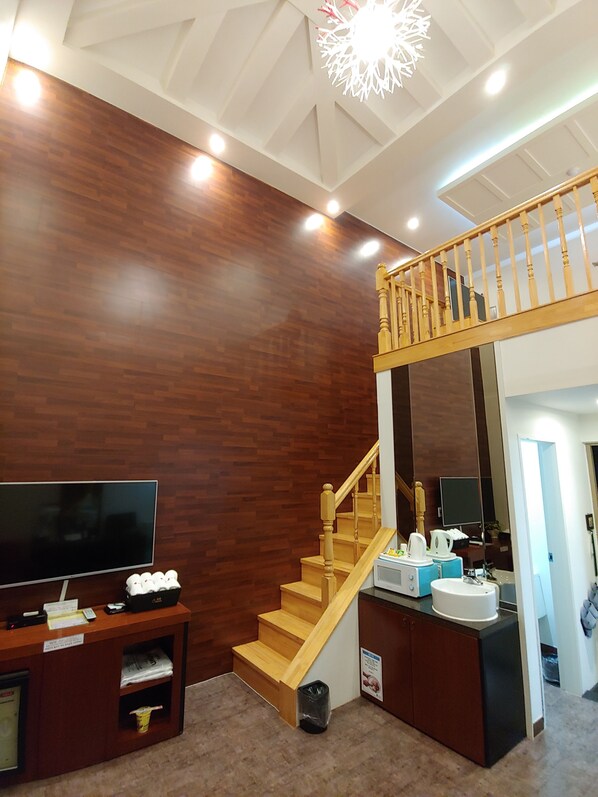 尊荣客房 | 高档床上用品、羽绒被、办公桌、笔记本电脑工作区