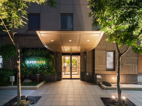 Front of property - evening/night. Super Hotel Umeda Higobashi
