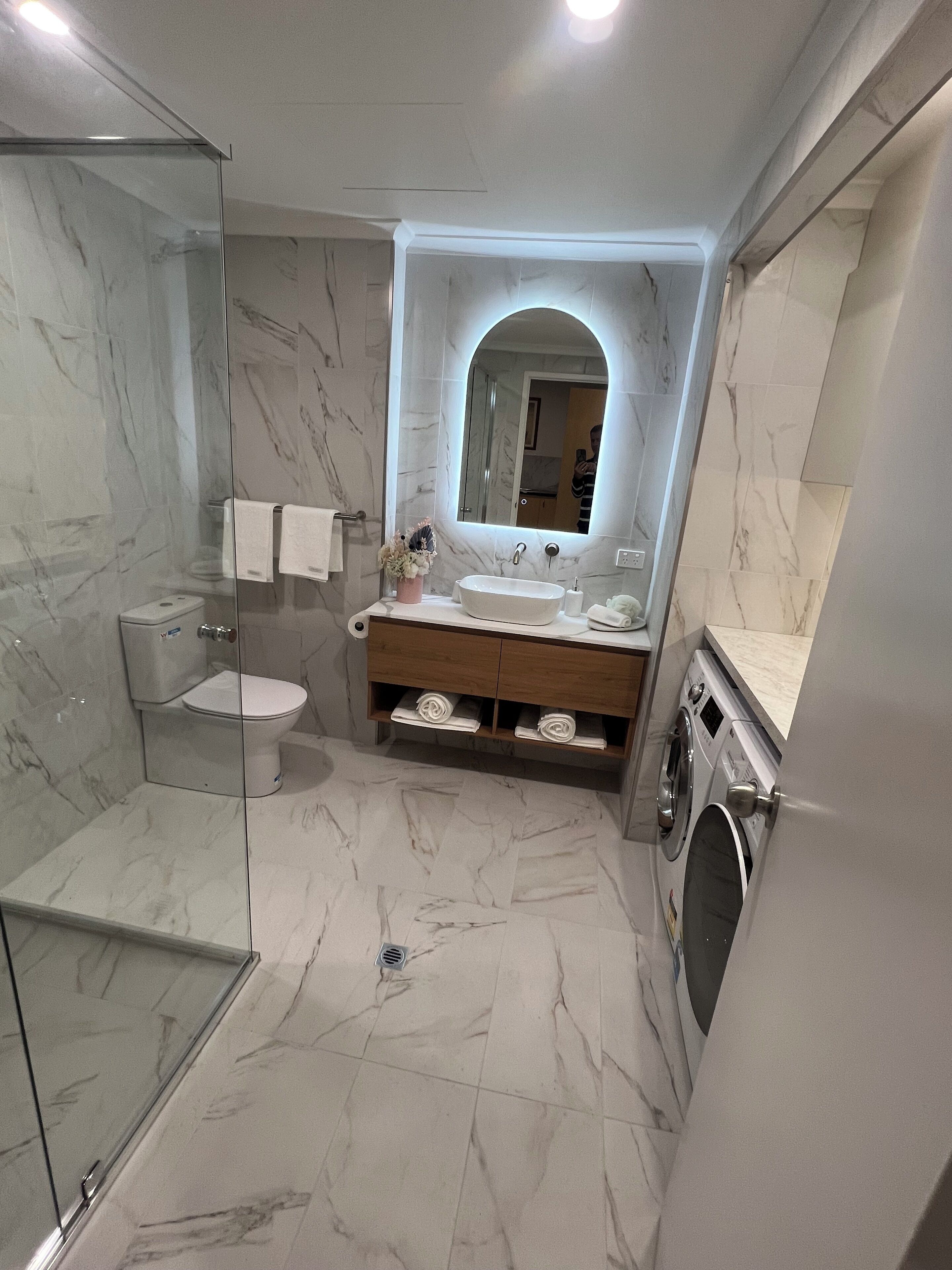 Combined shower/bathtub, hair dryer, towels, soap