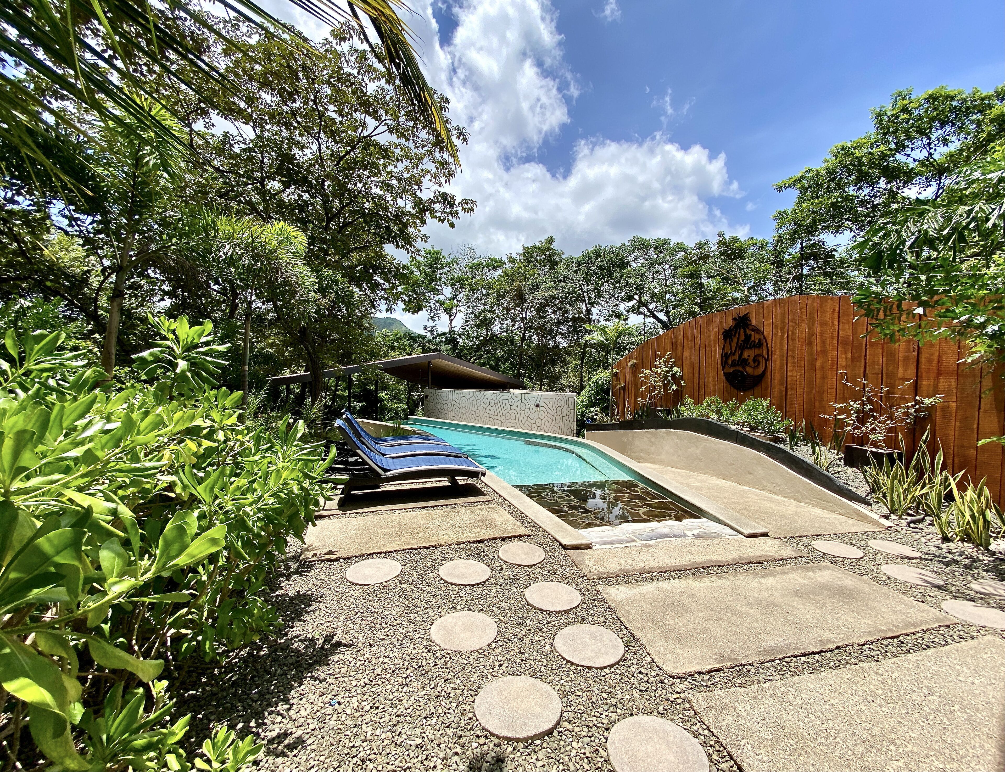 outdoor pool, open 6:30 am to 10:00 pm, pool loungers