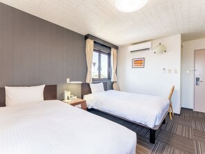 Desk, laptop workspace, free WiFi, bed sheets