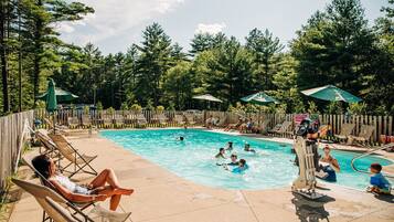 Outdoor pool, a heated pool, open 9:00 AM to 8:00 PM, pool umbrellas