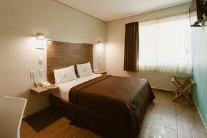 Desk, laptop workspace, blackout curtains, iron/ironing board